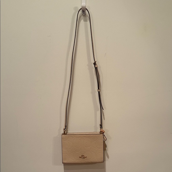 Coach Handbags - Coach Beige Pebbled Leather Crossbody with Signature Embossing